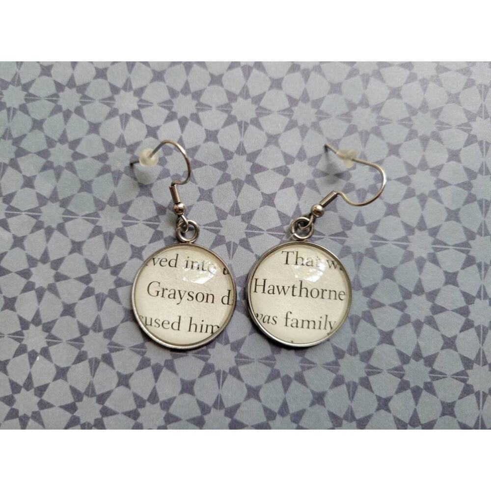 Grayson Hawthorne pendant earrings made with The Inheritance Games book pages